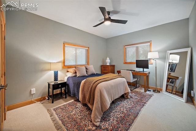 225 Laclede Ct, Colorado Springs, CO 80905 - carpeted bedroom with multiple windows, an office area, and a ceiling fan
