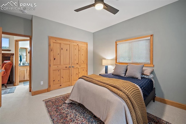225 Laclede Ct, Colorado Springs, CO 80905 - bedroom featuring light carpet, a ceiling fan, and a closet