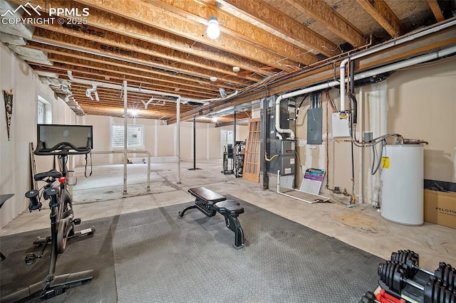 225 Laclede Ct, Colorado Springs, CO 80905 - exercise room featuring gas water heater, electric panel, and heating unit