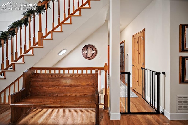 225 Laclede Ct, Colorado Springs, CO 80905 - staircase with baseboards and wood finished floors