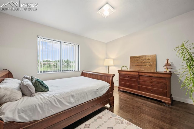 910 Fontmore Rd Unit D, Colorado Springs, CO 80904 - bedroom featuring wood finished floors and baseboards