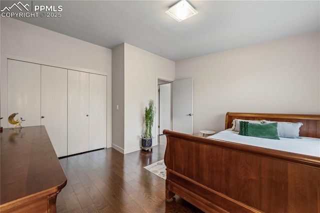 910 Fontmore Rd Unit D, Colorado Springs, CO 80904 - bedroom featuring dark wood-type flooring and baseboards