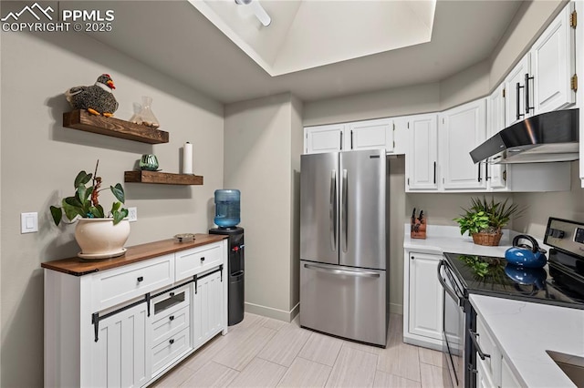 910 Fontmore Rd Unit D, Colorado Springs, CO 80904 - kitchen with appliances with stainless steel finishes, open shelves, under cabinet range hood, white cabinetry, and wooden counters