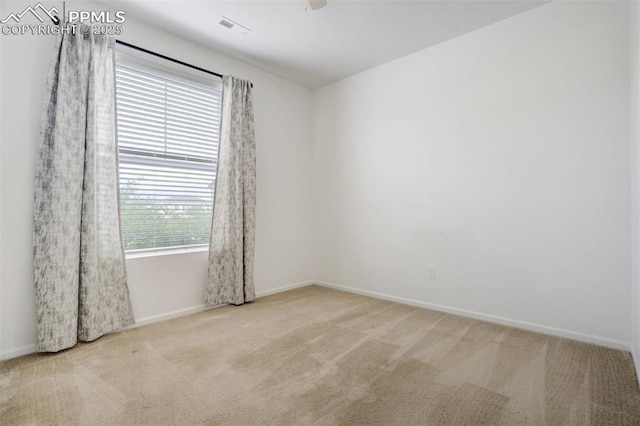 4887 Wolf Moon Dr, Colorado Springs, CO 80911 - carpeted spare room featuring baseboards and ceiling fan