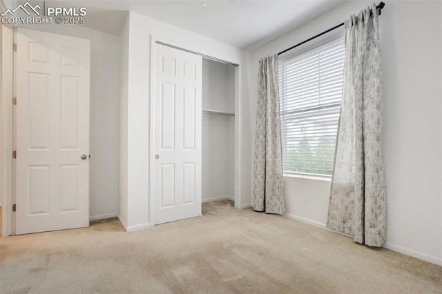 4887 Wolf Moon Dr, Colorado Springs, CO 80911 - unfurnished bedroom featuring carpet floors and a closet