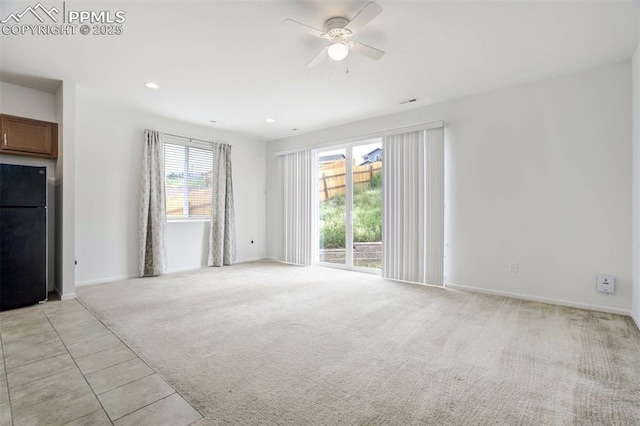 4887 Wolf Moon Dr, Colorado Springs, CO 80911 - unfurnished living room with light carpet, ceiling fan, and recessed lighting