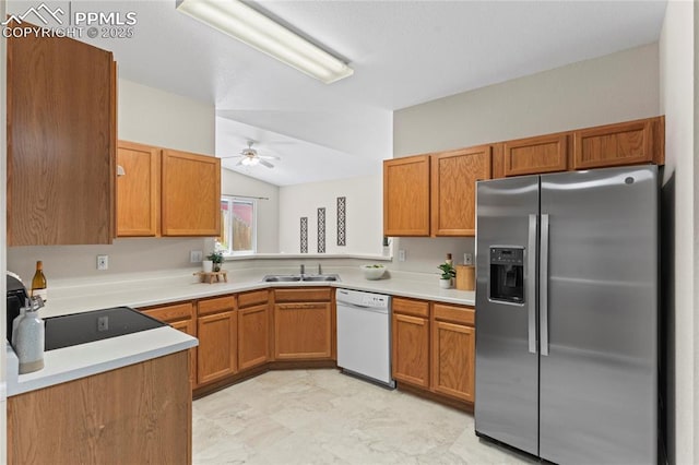 3025 Ebbtide Vw, Colorado Springs, CO 80922 - kitchen with stainless steel refrigerator with ice dispenser, dishwasher, ceiling fan, light countertops, and brown cabinets