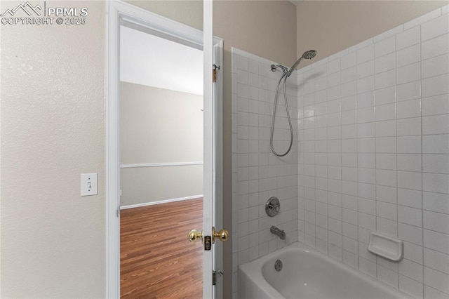 3025 Ebbtide Vw, Colorado Springs, CO 80922 - full bath featuring shower / tub combination and wood finished floors