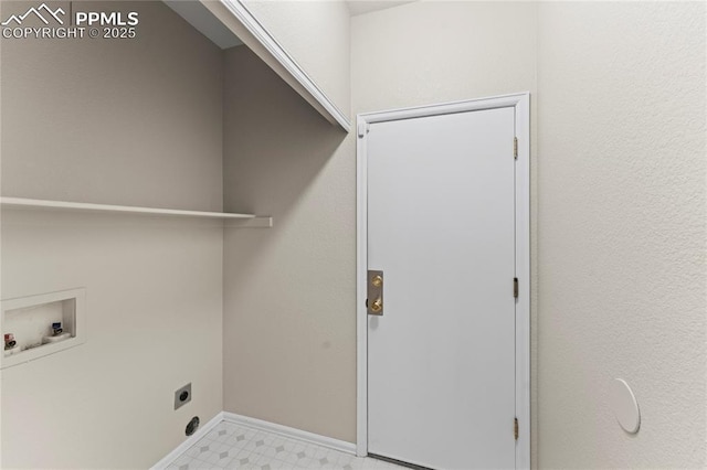 3025 Ebbtide Vw, Colorado Springs, CO 80922 - washroom with washer hookup, tile patterned floors, and electric dryer hookup