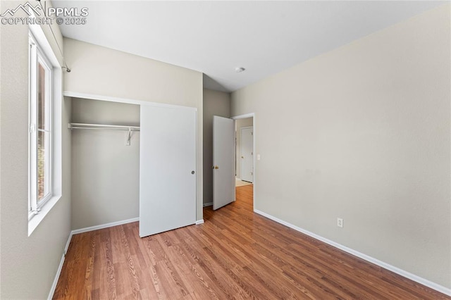 3025 Ebbtide Vw, Colorado Springs, CO 80922 - unfurnished bedroom with wood finished floors and a closet
