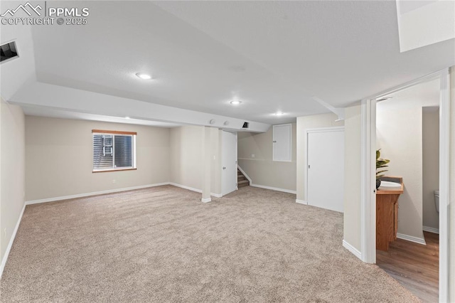 3025 Ebbtide Vw, Colorado Springs, CO 80922 - finished below grade area featuring carpet, recessed lighting, and stairway
