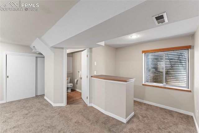 3025 Ebbtide Vw, Colorado Springs, CO 80922 - below grade area with carpet flooring and baseboards