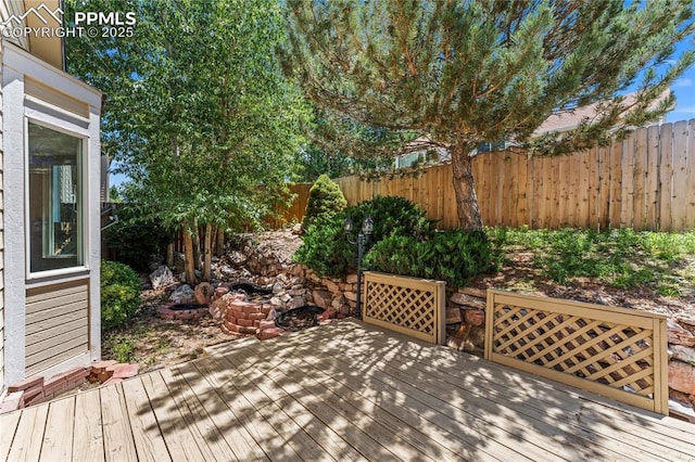 3025 Ebbtide Vw, Colorado Springs, CO 80922 - wooden terrace with a fenced backyard