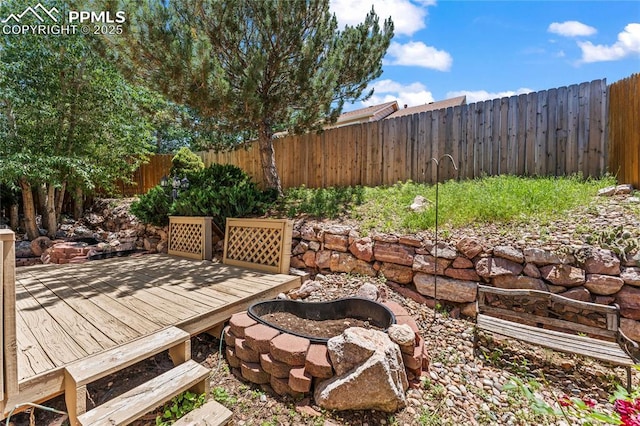 3025 Ebbtide Vw, Colorado Springs, CO 80922 - fenced backyard featuring a wooden deck