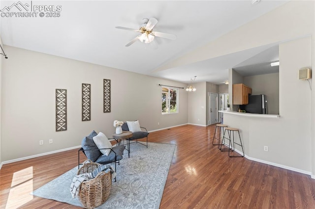 3025 Ebbtide Vw, Colorado Springs, CO 80922 - sitting room with lofted ceiling, a ceiling fan, and wood finished floors