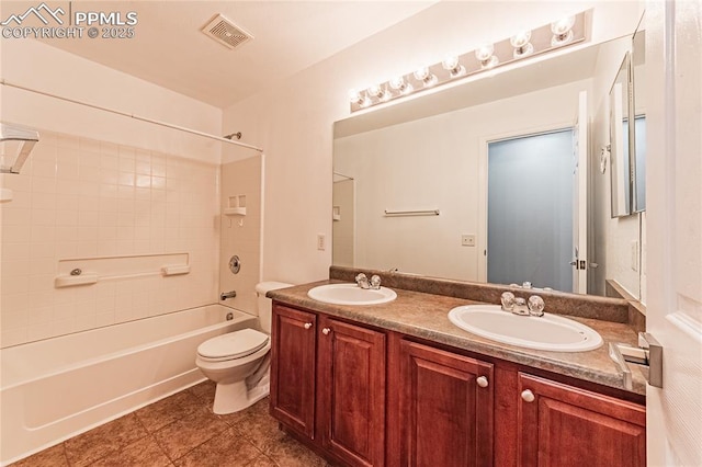 2513 Gilpin Ave, Colorado Springs, CO 80910 - bathroom with double vanity, shower / bathtub combination, and tile patterned flooring