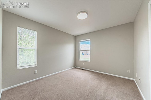 2513 Gilpin Ave, Colorado Springs, CO 80910 - carpeted spare room featuring baseboards