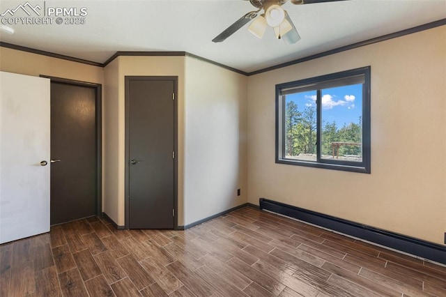 517 Drees Dr, Florissant, CO 80816 - unfurnished room featuring ornamental molding, wood finished floors, a ceiling fan, and a baseboard heating unit