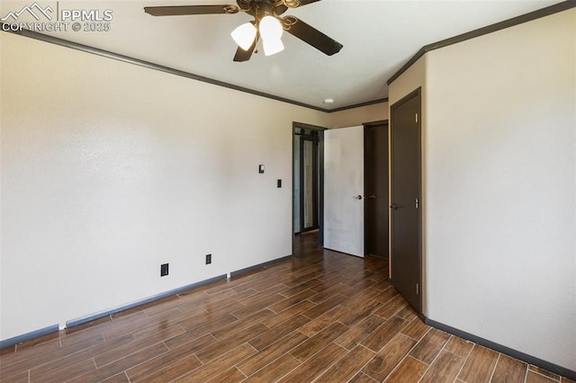517 Drees Dr, Florissant, CO 80816 - spare room with a ceiling fan, dark wood-style flooring, and ornamental molding