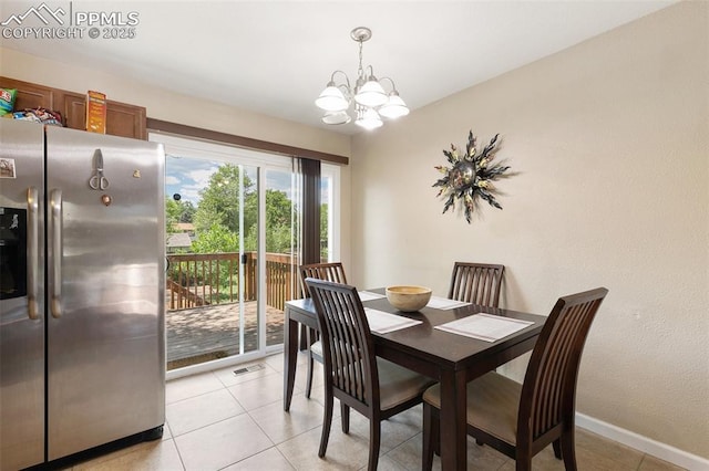 614 Bickley St, Colorado Springs, CO 80911 - dining space featuring a chandelier and light tile patterned floors