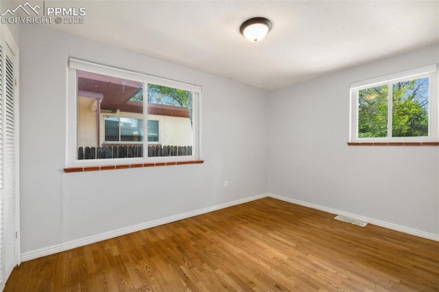 1406 N Foote Ave, Colorado Springs, CO 80909 - unfurnished room featuring wood finished floors and baseboards