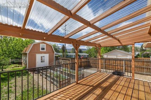 1406 N Foote Ave, Colorado Springs, CO 80909 - deck with a shed and a fenced backyard