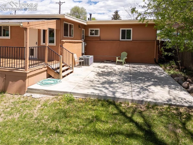 1406 N Foote Ave, Colorado Springs, CO 80909 - back of property with a patio and stucco siding