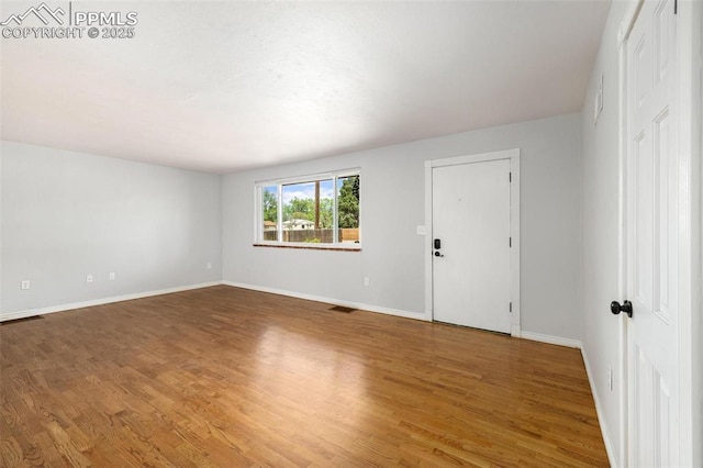 1406 N Foote Ave, Colorado Springs, CO 80909 - spare room with wood finished floors and baseboards