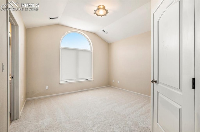 19170 Lochmere Ct, Monument, CO 80132 - carpeted empty room with lofted ceiling and baseboards