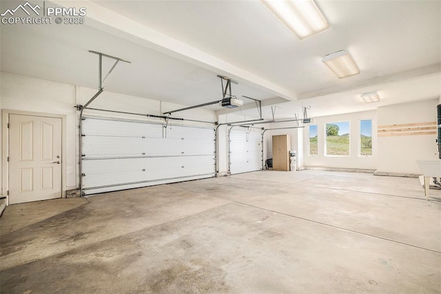 19170 Lochmere Ct, Monument, CO 80132 - garage featuring a garage door opener