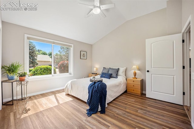 3470 Whimbrel Ln, Colorado Springs, CO 80906 - bedroom featuring wood finished floors, vaulted ceiling, and ceiling fan