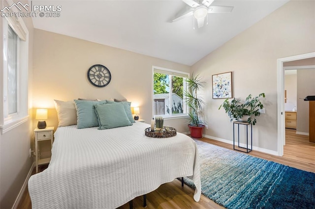 3470 Whimbrel Ln, Colorado Springs, CO 80906 - bedroom featuring wood finished floors, ceiling fan, and vaulted ceiling