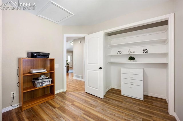 3470 Whimbrel Ln, Colorado Springs, CO 80906 - bedroom with attic access and wood finished floors