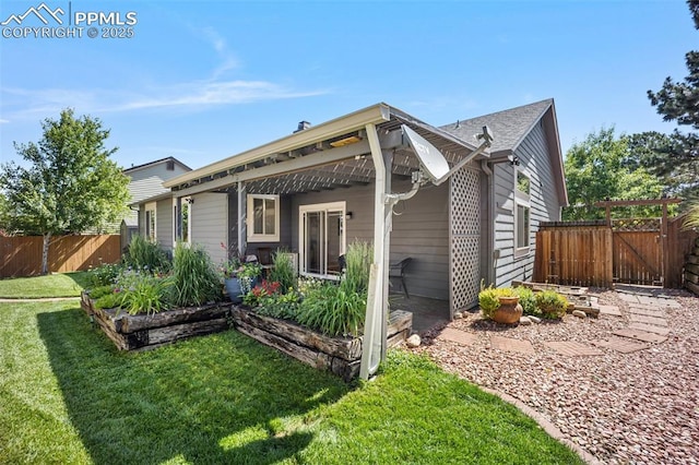 3470 Whimbrel Ln, Colorado Springs, CO 80906 - view of front of house featuring a gate and a patio area