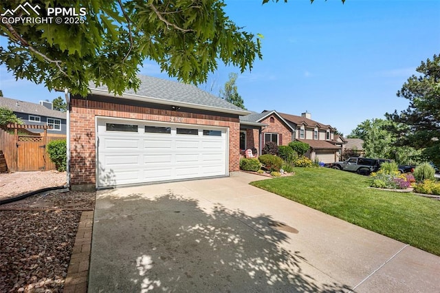 3470 Whimbrel Ln, Colorado Springs, CO 80906 - view of front of home featuring brick siding, concrete driveway, a garage, and a shingled roof