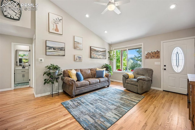 3470 Whimbrel Ln, Colorado Springs, CO 80906 - living room with light wood-style floors, ceiling fan, recessed lighting, and high vaulted ceiling