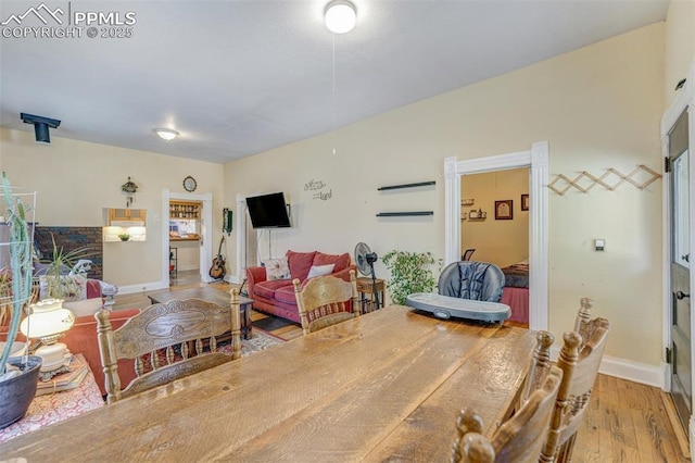 414 Griffin Ave, Canon City, CO 81212 - dining space featuring baseboards and wood finished floors