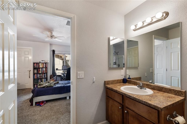 7104 Ash Creek Hts Unit 203, Colorado Springs, CO 80922 - bathroom with vanity and ceiling fan