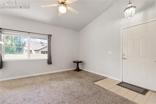 7104 Ash Creek Hts Unit 203, Colorado Springs, CO 80922 - entrance foyer featuring lofted ceiling, light carpet, and ceiling fan