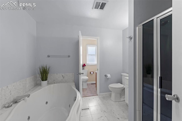 811 N Baldwin St, Woodland Park, CO 80863 - bathroom with a jetted tub and a stall shower