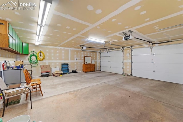 811 N Baldwin St, Woodland Park, CO 80863 - garage featuring a garage door opener