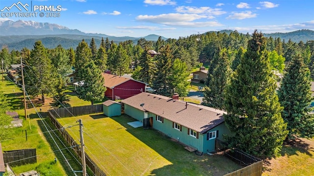 811 N Baldwin St, Woodland Park, CO 80863 - view from above of property with a mountainous background and a forest