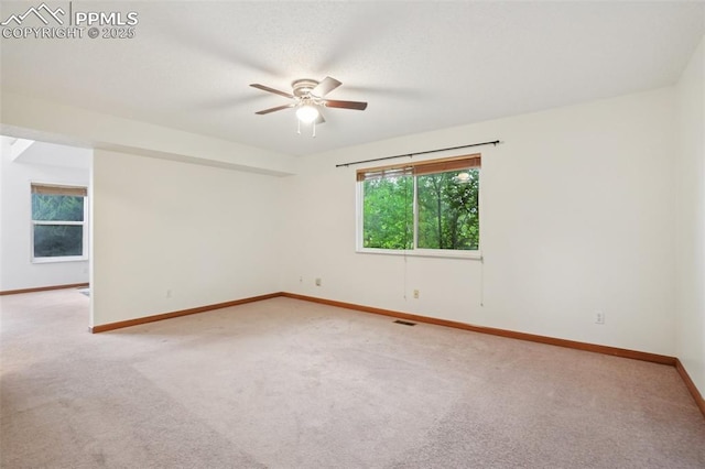 4903 Wainwright Dr, Colorado Springs, CO 80911 - empty room featuring light colored carpet and ceiling fan