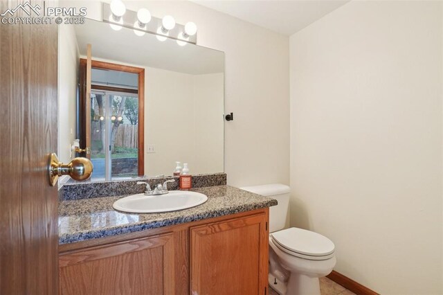 4903 Wainwright Dr, Colorado Springs, CO 80911 - bathroom featuring vanity and toilet