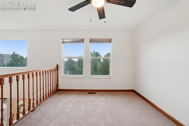 4903 Wainwright Dr, Colorado Springs, CO 80911 - carpeted empty room featuring plenty of natural light and a ceiling fan