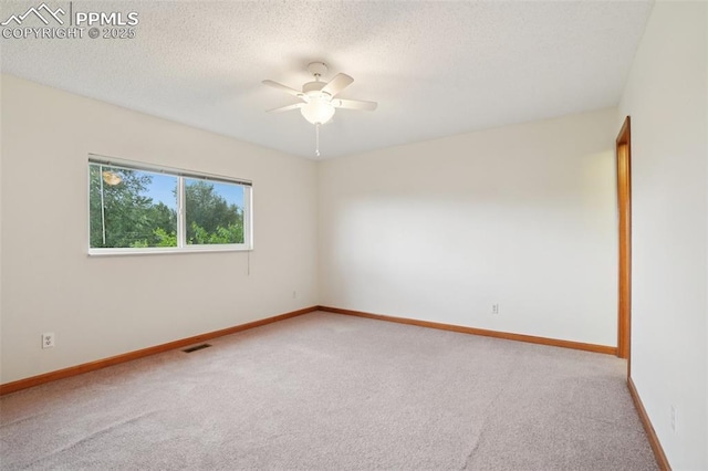 4903 Wainwright Dr, Colorado Springs, CO 80911 - carpeted empty room featuring ceiling fan and a textured ceiling