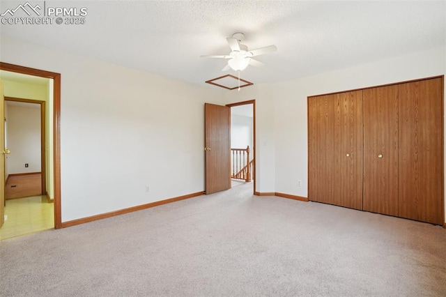 4903 Wainwright Dr, Colorado Springs, CO 80911 - unfurnished bedroom with light colored carpet, a closet, and ceiling fan