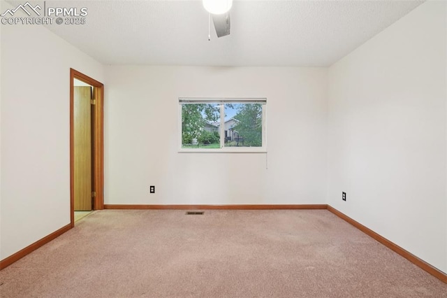 4903 Wainwright Dr, Colorado Springs, CO 80911 - spare room featuring carpet floors and ceiling fan