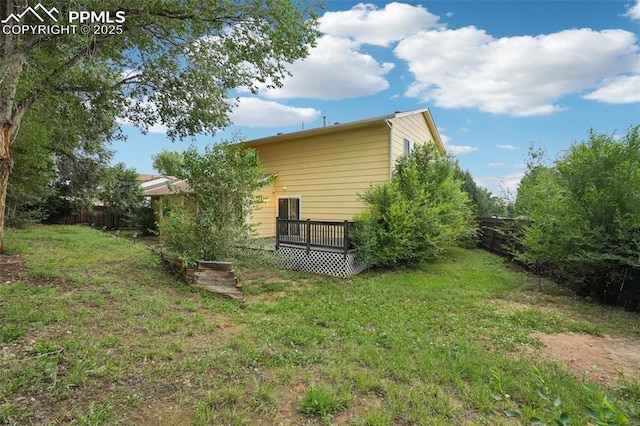 4903 Wainwright Dr, Colorado Springs, CO 80911 - view of side of home featuring a deck