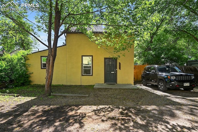 823 N Corona St, Colorado Springs, CO 80903 - view of front facade with stucco siding